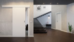 Schiebetür Weiß RAL 9016 CPL - Interio mit vor der Wand laufendem System im Wohnzimmer
