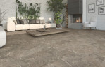 Milieubild Wohnbereich von Granit dunkel Steinstruktur Autentico Laminat - Wiparquet