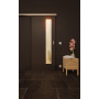 Front-Milieuansicht der vor der Wand laufenden GARANT Feuchtraum-Schiebetür 10622-60 Ebony Resopal mit Lichtausschnitt LA-4 schlossseitig